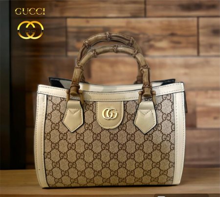 شنطة Gucci ستاتي - بيج <br> <span class='text-color-warm'>سيتوفر قريباً</span>